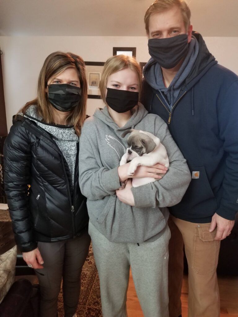 Proud French Bulldog puppy parents